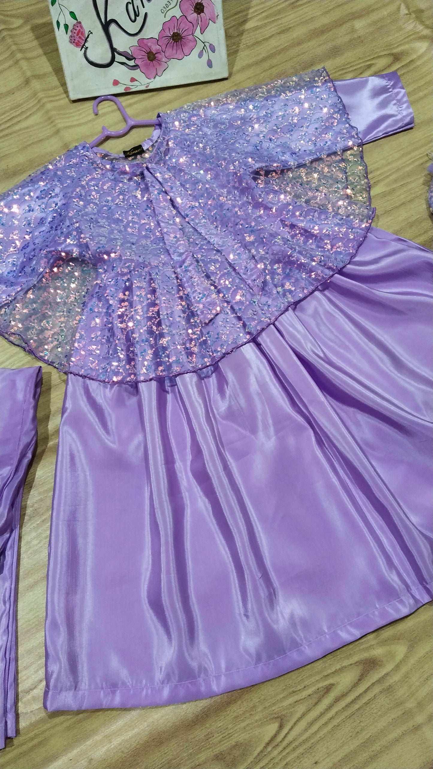 Katan Silk Fabric Frock, Trouser with Net Fabric Jacket . Potli bag.