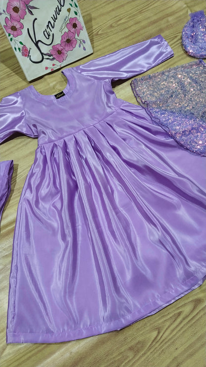 Katan Silk Fabric Frock, Trouser with Net Fabric Jacket  . Potli bag.