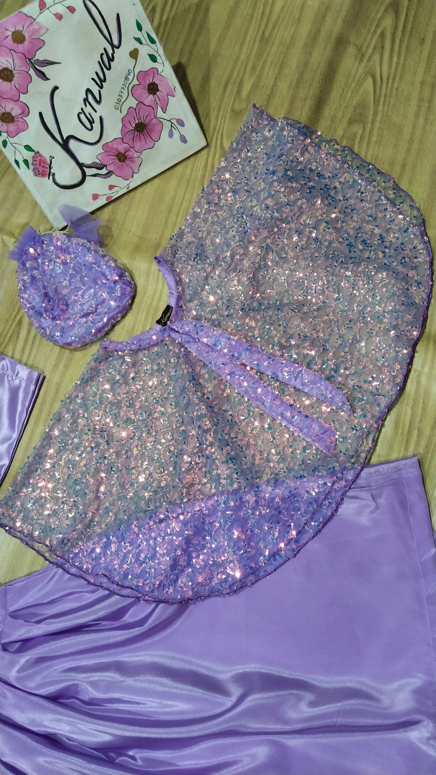 Katan Silk Fabric Frock, Trouser with Net Fabric Jacket  . Potli bag.